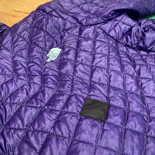 Patched up insulated jacket.