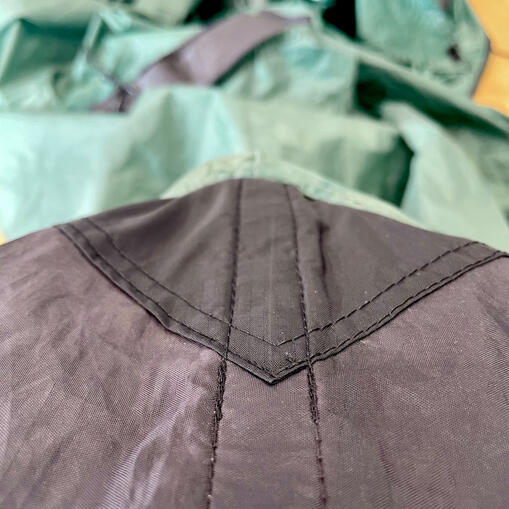 Patched and reinforced tent.